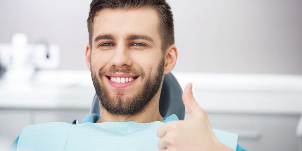 Satisfied patient after affordable emergency dental treatment