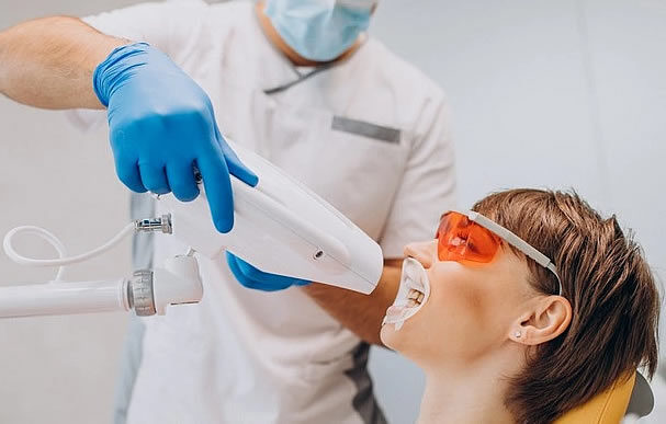 Patient receiving professional teeth whitening