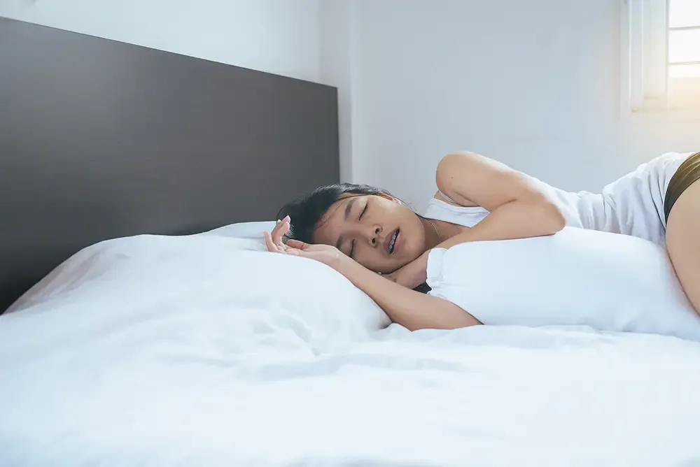 Person sleeping peacefully with nightguard protection