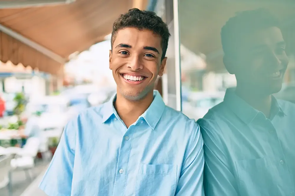 Man smiling outdoors